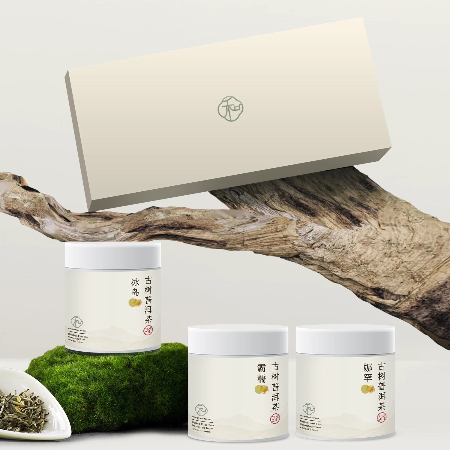 a set of ancient tree puer tea miniature tea gift set with three premium Chinese loose leaf teas packaged in white tea tins in branded elegant white packaging